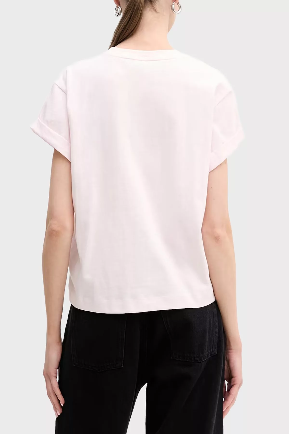 Camiseta rosa claro con strass y logo GUESS